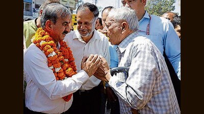 Himachal Pradesh chief minister Sukhvinder Singh greets an elderly man in Hamirpur on Tuesday. (HT Photo) Himachal Pradesh chief minister Sukhvinder Singh greets an elderly man in Hamirpur on Tuesday. (HT Photo)