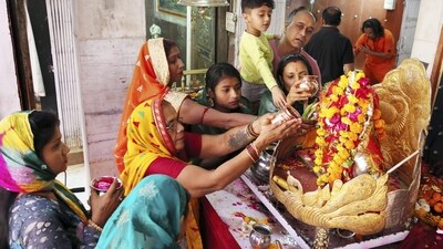 Devotees in large numbers thronged temples across the country to offer prayers on the occasion of the first day of Chaitra Navaratri on Tuesday. (PTI) Devotees in large numbers thronged temples across the country to offer prayers on the occasion of the first day of Chaitra Navaratri on Tuesday. (PTI)