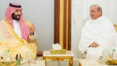 Saudi Crown Prince Mohammed bin Salman meets Pakistan's Prime Minister Shehbaz Sharif in his palace on the eve of 29th Ramadan in the holy city of Mecca on April 7. (REUTERS)