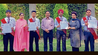 Students of GSSS, Lalton Kalan, receiving certificates after mountaineering camp in Ludhiana on Tuesday. (HT Photo)