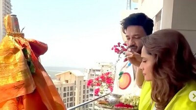 Ankita Lokhande and Vicky Jain celebrate the festival in their balcony. The occasion signals the onset of the warmer days and the spring season. The festival is observed with colourful floor decorations, a special Gudhi flag garlanded with flowers, mango and neem leaves, and topped with upturned silver or copper vessels, street processions, dancing and festive foods like shrikhand puri. Ankita Lokhande and Vicky Jain celebrate the festival in their balcony. The occasion signals the onset of the warmer days and the spring season. The festival is observed with colourful floor decorations, a special Gudhi flag garlanded with flowers, mango and neem leaves, and topped with upturned silver or copper vessels, street processions, dancing and festive foods like shrikhand puri. 