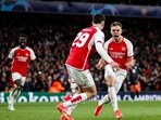 Arsenal's Belgian midfielder #19 Leandro Trossard (R) celebrates Arsenal's Belgian midfielder #19 Leandro Trossard (R) celebrates