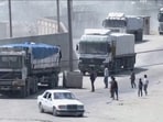 A convoy of aid trucks drives into Gaza from Rafah crossing