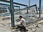 Mumbai, India - April 6, 2024: Workers dismantling the COVID facility centre constructed by MAHADA at Somiaya grounds, Chunabhatti, in Mumbai, India, on Saturday, April 6, 2024. (Photo by Anshuman Poyrekar/ Hindustan Times) (Hindustan Times)
