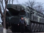 North Korean leader Kim Jong Un (C) inspecting the first test-fire of Hwasongpho-16B, a new-type intermediate-range solid-fueled ballistic missile North Korean leader Kim Jong Un (C) inspecting the first test-fire of Hwasongpho-16B, a new-type intermediate-range solid-fueled ballistic missile