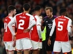 Arsenal's Gabriel and Bayern Munich's Harry Kane after the match 