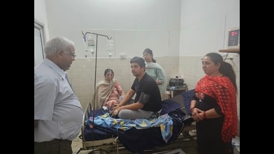 A team of Fazilka administration speaking to patients at a government hospital in Jalalabad on Wednesday. (HT Photo)