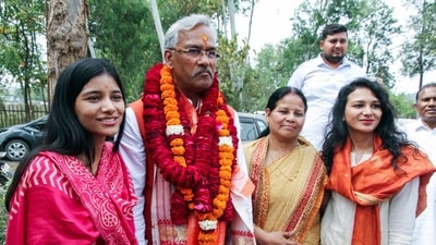 Former Uttarakhand CM and BJP leader Trivendra Singh Rawat along with his family (ANI file photo)