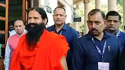 Yog Guru Baba Ramdev appears before the Supreme Court for the hearing in the misleading advertisement case filed against the Patanjali Ayurveda, in New Delhi. (ANI Photo)