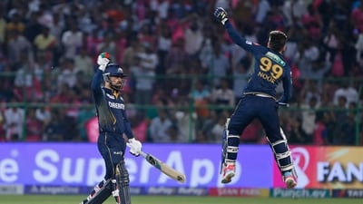Rashid Khan smashed a boundary on the final ball to seal GT's win over RR (AP) Rashid Khan smashed a boundary on the final ball to seal GT's win over RR (AP)