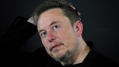 Elon Musk appears at an event in London. (AP) Elon Musk appears at an event in London. (AP)