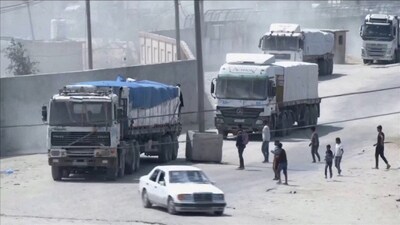 A convoy of aid trucks drives into Gaza from Rafah crossing (REUTERS)