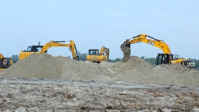 Mining in progress at Thottappally Pozhi. (Photos: K A Shaji) Mining in progress at Thottappally Pozhi. (Photos: K A Shaji)