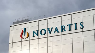 Novartis layoffs: The company's logo is seen at the new cell and gene therapy factory of Swiss drugmaker Novartis in Stein, Switzerland. (Reuters)