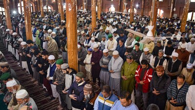 People offer namaz during Eid-ul-Fitr celebrations at the historic Aali Masjid Eidgah in Srinagar on Wednesday. (PTI) People offer namaz during Eid-ul-Fitr celebrations at the historic Aali Masjid Eidgah in Srinagar on Wednesday. (PTI)