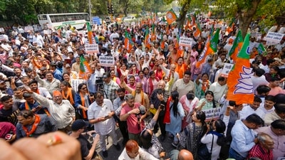 Delhi Bharatiya Janata Party (BJP) workers staged a protest near the AAP headquarters on DDU Marg in New Delhi on Wednesday, demanding the resignation of Chief Minister Arvind Kejriwal over the alleged excise scam. (PTI) Delhi Bharatiya Janata Party (BJP) workers staged a protest near the AAP headquarters on DDU Marg in New Delhi on Wednesday, demanding the resignation of Chief Minister Arvind Kejriwal over the alleged excise scam. (PTI)