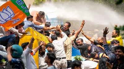 The protest comes a day after Arvind Kejriwal's plea against his arrest was rejected by the Delhi High Court on Tuesday. (PTI) The protest comes a day after Arvind Kejriwal's plea against his arrest was rejected by the Delhi High Court on Tuesday. (PTI)