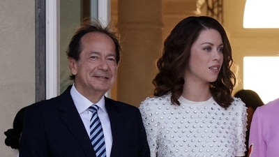 John Paulson, 68, is engaged to Alina de Almeida, 35, amid his ongoing divorce battle with Jenny Paulson (Getty Images via AFP) John Paulson, 68, is engaged to Alina de Almeida, 35, amid his ongoing divorce battle with Jenny Paulson (Getty Images via AFP)