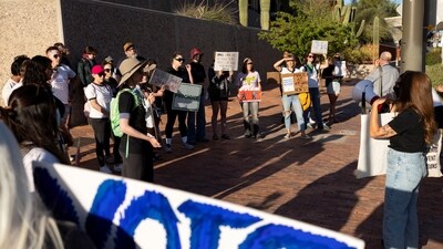 Protesters take part in a small rally led by Women's March Tucson after Arizona's Supreme Court revived a law dating to 1864 that bans abortion in virtually all instances. (Reuters)