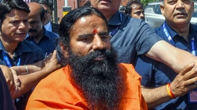 Baba Ramdev leaves the Supreme Court after appearing in the misleading advertisements case on Tuesday. (ANI) Baba Ramdev leaves the Supreme Court after appearing in the misleading advertisements case on Tuesday. (ANI)