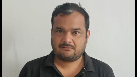 Ravi Atri in UP special task force custody on Wednesday. (HT Photo)
