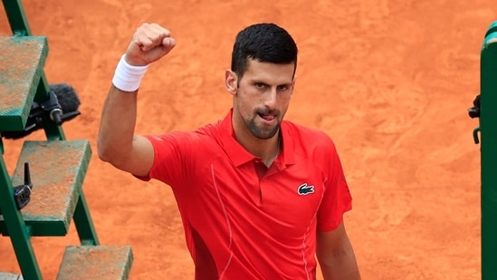 Serbia's Novak Djokovic celebrates after winning against Russia's Roman Safiullin at the end of their Monte Carlo ATP Masters Series Tournament round of 32 (AFP)