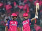 Rajasthan Royals' Riyan Parag celebrates his half-century as captain Sanju Samson looks on. Rajasthan Royals' Riyan Parag celebrates his half-century as captain Sanju Samson looks on.