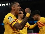 Barcelona's Raphinha celebrates scoring his side's second goal during the Champions League quarterfinal first leg soccer match between Paris Saint-Germain and Barcelona