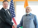 Prime Minister Narendra Modi shakes hand with Tesla chief executive Elon Musk (Reuters)