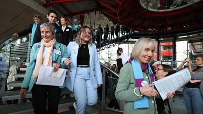Members of Swiss association Senior Women for Climate Protection react after the announcement of decisions after a hearing of the European Court of Human Rights (ECHR) to decide in three separate cases if states are doing enough in the face of global warming in rulings that could force them to do more, in Strasbourg, eastern France, on April 9, 2024. (Photo by Frederick FLORIN / AFP) (AFP) Members of Swiss association Senior Women for Climate Protection react after the announcement of decisions after a hearing of the European Court of Human Rights (ECHR) to decide in three separate cases if states are doing enough in the face of global warming in rulings that could force them to do more, in Strasbourg, eastern France, on April 9, 2024. (Photo by Frederick FLORIN / AFP) (AFP)