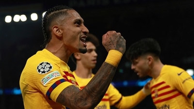 Barcelona's Raphinha celebrates scoring his side's second goal during the Champions League quarterfinal first leg soccer match between Paris Saint-Germain and Barcelona (AP) Barcelona's Raphinha celebrates scoring his side's second goal during the Champions League quarterfinal first leg soccer match between Paris Saint-Germain and Barcelona (AP)