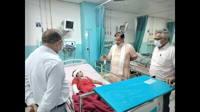 Haryana health minister Dr Kamal Gupta meeting with injured students at a private hospital in Rewari. (HT Photo) Haryana health minister Dr Kamal Gupta meeting with injured students at a private hospital in Rewari. (HT Photo)
