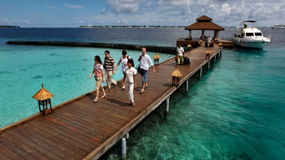 FILE- Foreign tourists arrive in a resort in the Kurumba island in Maldives, Feb. 12, 2012. Relationship between India and the Maldives is facing challenges after officials in the tiny island nation made derogatory remarks against Prime Minister Narendra Modi’s posts that promoted the pristine beaches of India’s Lakshadweep archipelago. (AP Photo/ Gemunu Amarasinghe, File) FILE- Foreign tourists arrive in a resort in the Kurumba island in Maldives, Feb. 12, 2012. Relationship between India and the Maldives is facing challenges after officials in the tiny island nation made derogatory remarks against Prime Minister Narendra Modi’s posts that promoted the pristine beaches of India’s Lakshadweep archipelago. (AP Photo/ Gemunu Amarasinghe, File)