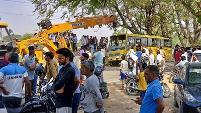 Locals near a damaged school bus after an accident near Mahendragarh in Narnaul district in Haryana on Thursday. (PTI) Locals near a damaged school bus after an accident near Mahendragarh in Narnaul district in Haryana on Thursday. (PTI)