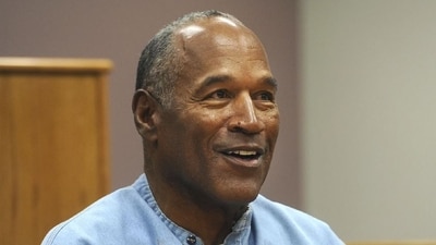 Simpson earned fame, fortune and adulation through football and show business (AP)
