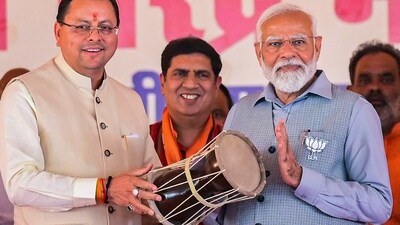 Uttarakhand Chief Minister Pushkar Singh Dhami was also present at the rally. (PTI) Uttarakhand Chief Minister Pushkar Singh Dhami was also present at the rally. (PTI)