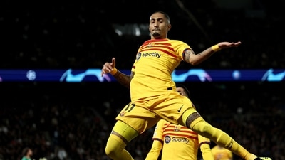 Barcelona's Brazilian forward Raphinha leaps in the air as he celebrates scoring Barcelona's second goal during the UEFA Champions League quarter vs Paris Saint-Germain (PSG) (AFP) Barcelona's Brazilian forward Raphinha leaps in the air as he celebrates scoring Barcelona's second goal during the UEFA Champions League quarter vs Paris Saint-Germain (PSG) (AFP)