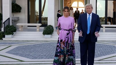 Calling Melania a "very independent and strong woman", Stephanie Grisham described an incident when the former first lady refused to walk out with Donald Trump. (Getty Images via AFP)