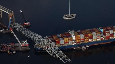 BALTIMORE, MARYLAND - APRIL 09: In an aerial view, salvage crews continue to remove wreckage from the cargo ship Dali after it stuck and collapsed the Francis Scott Key Bridge, April 09, 2024 in Baltimore, Maryland. (Getty Images via AFP) BALTIMORE, MARYLAND - APRIL 09: In an aerial view, salvage crews continue to remove wreckage from the cargo ship Dali after it stuck and collapsed the Francis Scott Key Bridge, April 09, 2024 in Baltimore, Maryland. (Getty Images via AFP)