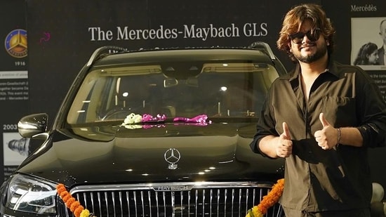 Vishal Mishra poses with his black Mercedes-Benz Maybach GLS 600.