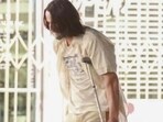 A fan account shared photos of Keanu Reeves walking with crutches earlier this year.