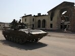 Ukrainian servicemen drive an infantry fighting vehicle (IVF) past the destroyed railway station in the town of Kostyantynivka, Donetsk region, on April 11, 2024, amid the Russian invassion in Ukraine. (Photo by Anatolii STEPANOV / AFP) Ukrainian servicemen drive an infantry fighting vehicle (IVF) past the destroyed railway station in the town of Kostyantynivka, Donetsk region, on April 11, 2024, amid the Russian invassion in Ukraine. (Photo by Anatolii STEPANOV / AFP)