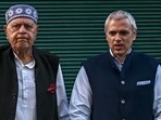 Jammu and Kashmir National Conference president Farooq Abdullah (L) along with his son and former Jammu and Kashmir chief minister Omar Abdullah.(AFP)