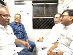 Uddhav Thackeray seen travelling in a Mumbai local train post his visit to Palghar on Friday. Uddhav Thackeray seen travelling in a Mumbai local train post his visit to Palghar on Friday.