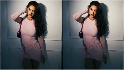 Her dress comes in a pastel pink hue and features long sleeves and a statement metallic pink 3D curve detail with an asymmetric ruffled hem that falls to the floor for a touch of drama. The mini hem and bodycon fit perfectly accentuate her voluptuous curves. (Instagram/@dishapatani) Her dress comes in a pastel pink hue and features long sleeves and a statement metallic pink 3D curve detail with an asymmetric ruffled hem that falls to the floor for a touch of drama. The mini hem and bodycon fit perfectly accentuate her voluptuous curves. (Instagram/@dishapatani)