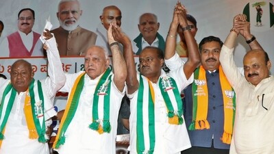 B. S. Yediyurappa, along with son Vijayendra, HD Kumaraswamy, BS Bommai, and Deve Gowda. (hd kumaraswamy-X) B. S. Yediyurappa, along with son Vijayendra, HD Kumaraswamy, BS Bommai, and Deve Gowda. (hd kumaraswamy-X)