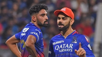 Royal Challengers Bengaluru's Virat Kohli and Mohammed Siraj (ANI) Royal Challengers Bengaluru's Virat Kohli and Mohammed Siraj (ANI)