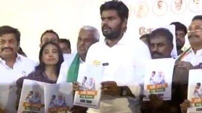Tamil Nadu BJP president and former IPS officer K Annamalai on Friday released party's manifesto for the Coimbatore Lok Sabha constituency from where he is contesting the upcoming polls. Tamil Nadu BJP president and former IPS officer K Annamalai on Friday released party's manifesto for the Coimbatore Lok Sabha constituency from where he is contesting the upcoming polls.