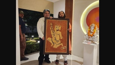 The image shows Anand Ambani with his birthday gift from Bharat Mehra - an MF Husain painting. (Instagram/@bharatjmehra11) The image shows Anand Ambani with his birthday gift from Bharat Mehra - an MF Husain painting. (Instagram/@bharatjmehra11)