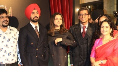 Diljit Dosanjh and Parineeti Chopra, who have portrayed the roles of Amar Singh Chamkila and his wife Amarjot Kaur in the film, decided to twin in black on their big night. While Chopra looked elegant in a black suit, Dosanjh was dapper in a double breasted blazer Diljit Dosanjh and Parineeti Chopra, who have portrayed the roles of Amar Singh Chamkila and his wife Amarjot Kaur in the film, decided to twin in black on their big night. While Chopra looked elegant in a black suit, Dosanjh was dapper in a double breasted blazer